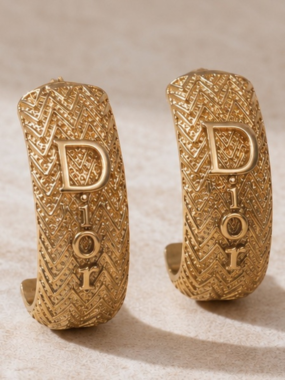 Designer Inspired Textured Hoop Earrings – Gold Tone